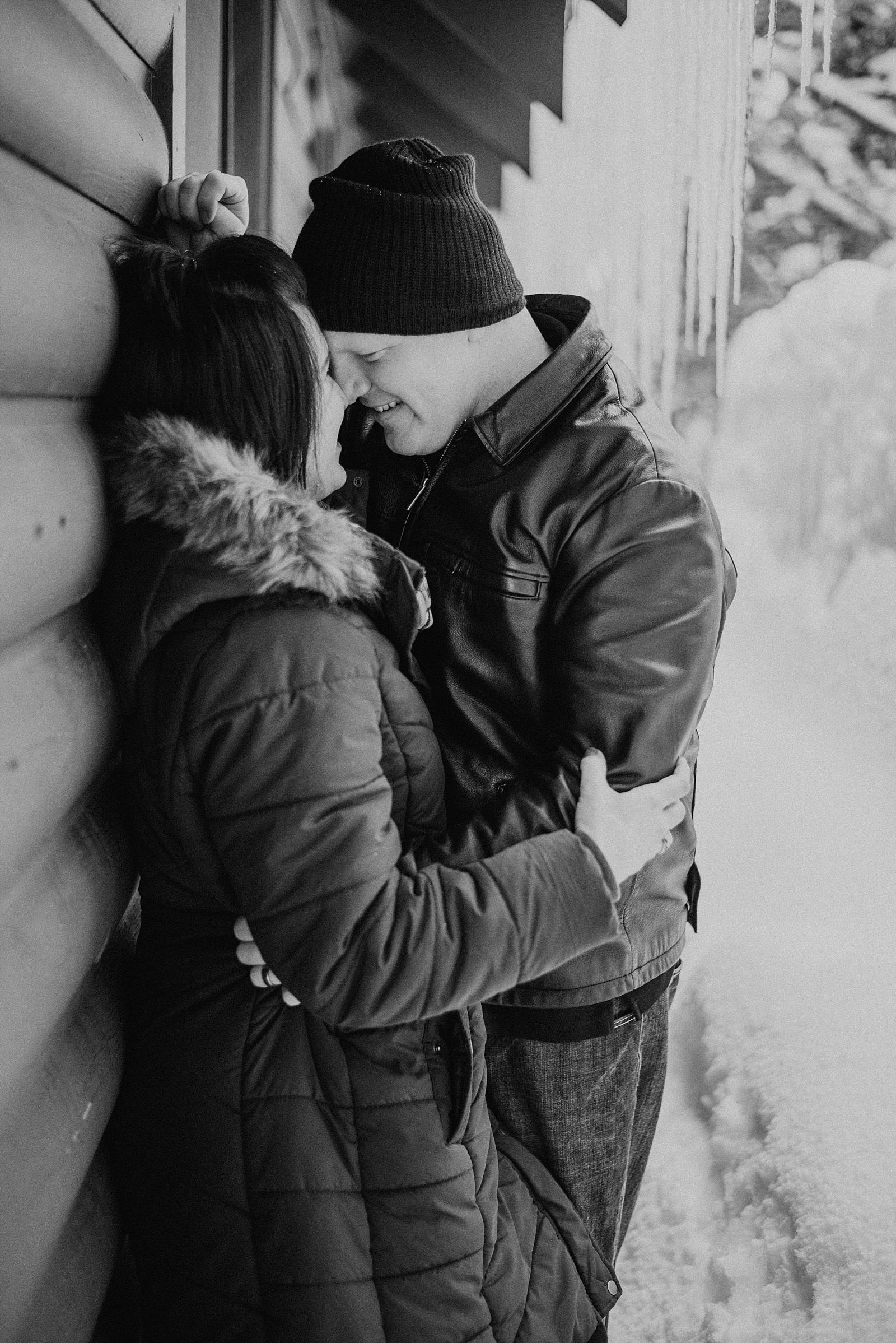 winter engagement session at cabin