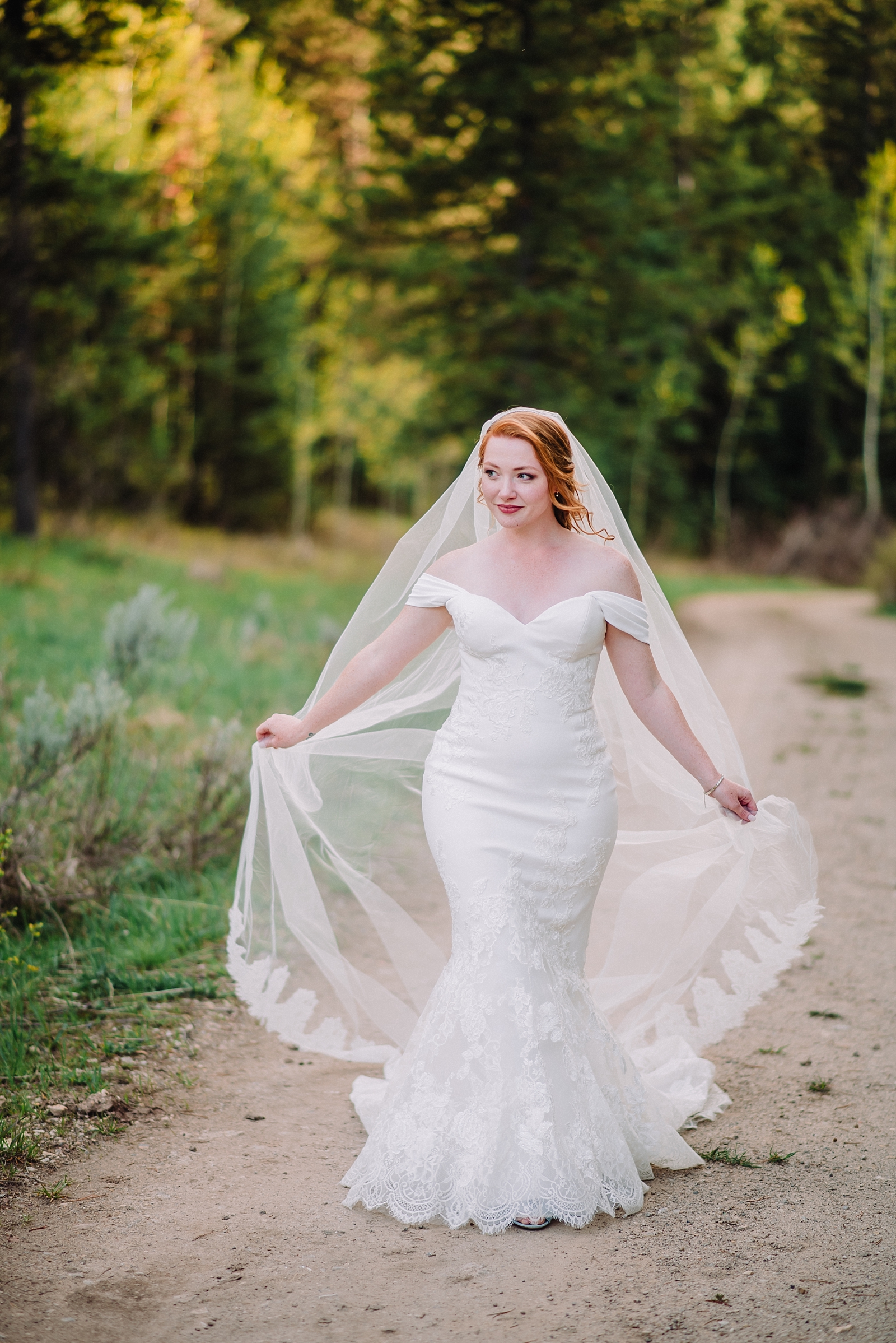 bride walking with veil and mermaid dress elegant timeless