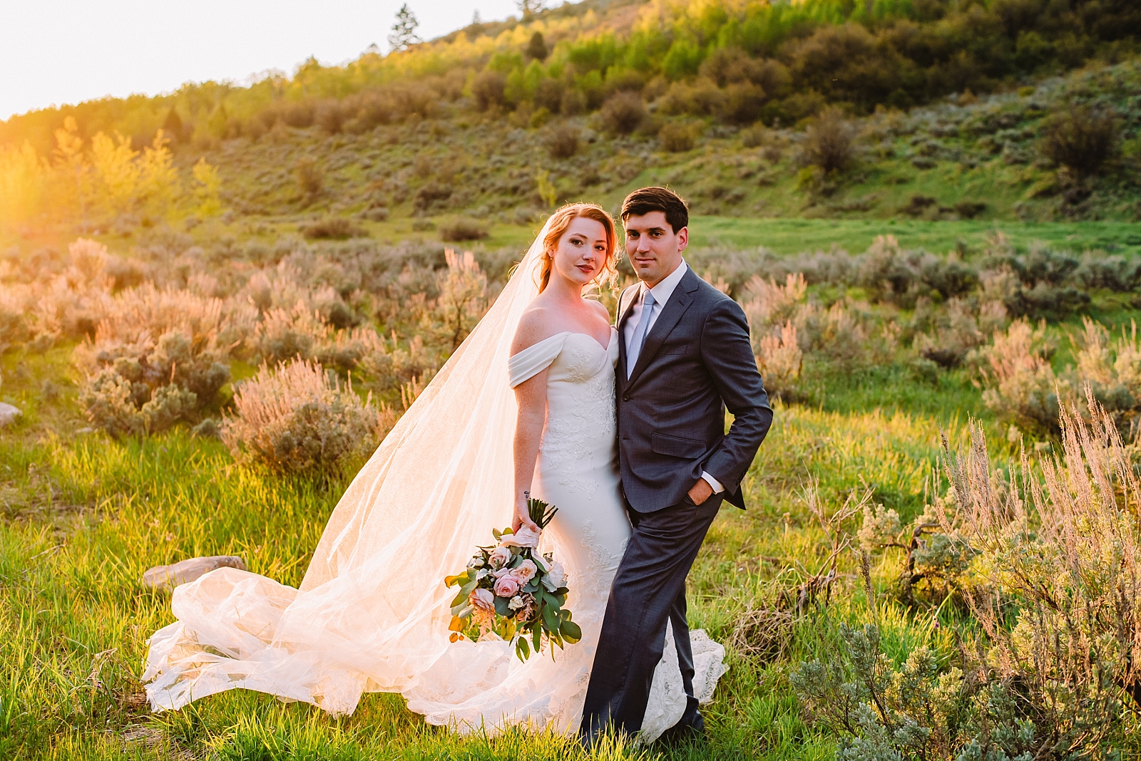 bride and groom in mountains sage brush idaho
