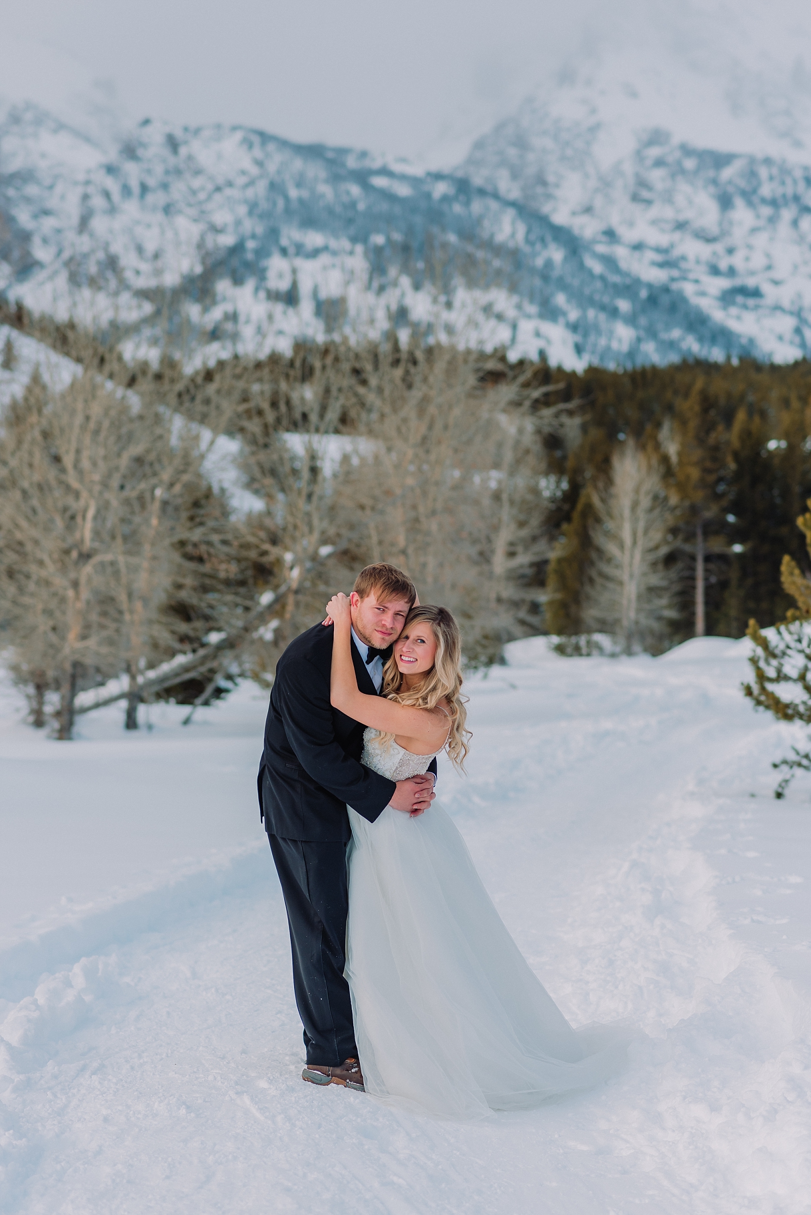 destination-elopement-photography-romantic-fun-wedding-photographer-jackson-hole-wyoming-snow-winter-bride-and-groom-teton-mountains