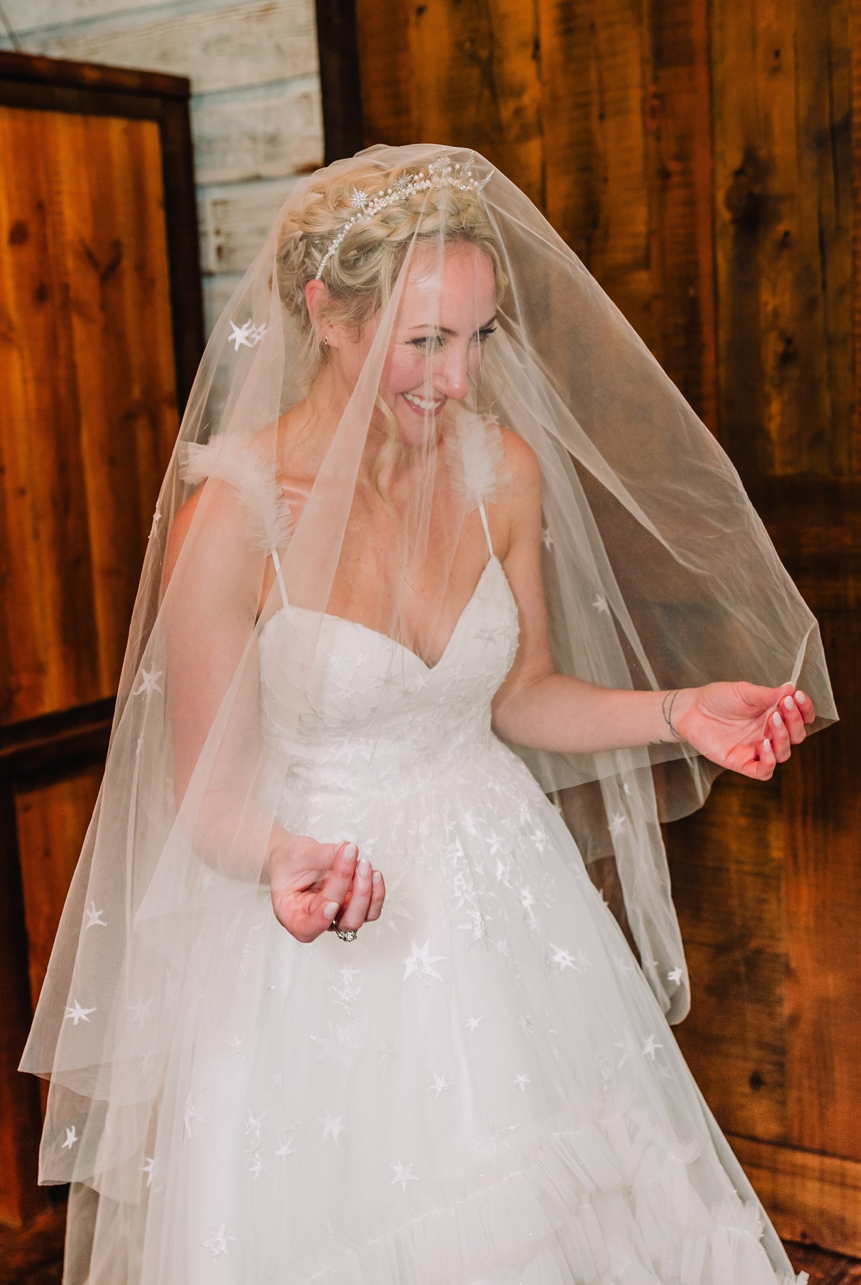 bride with veil indoor cabin at moose creek ranch
