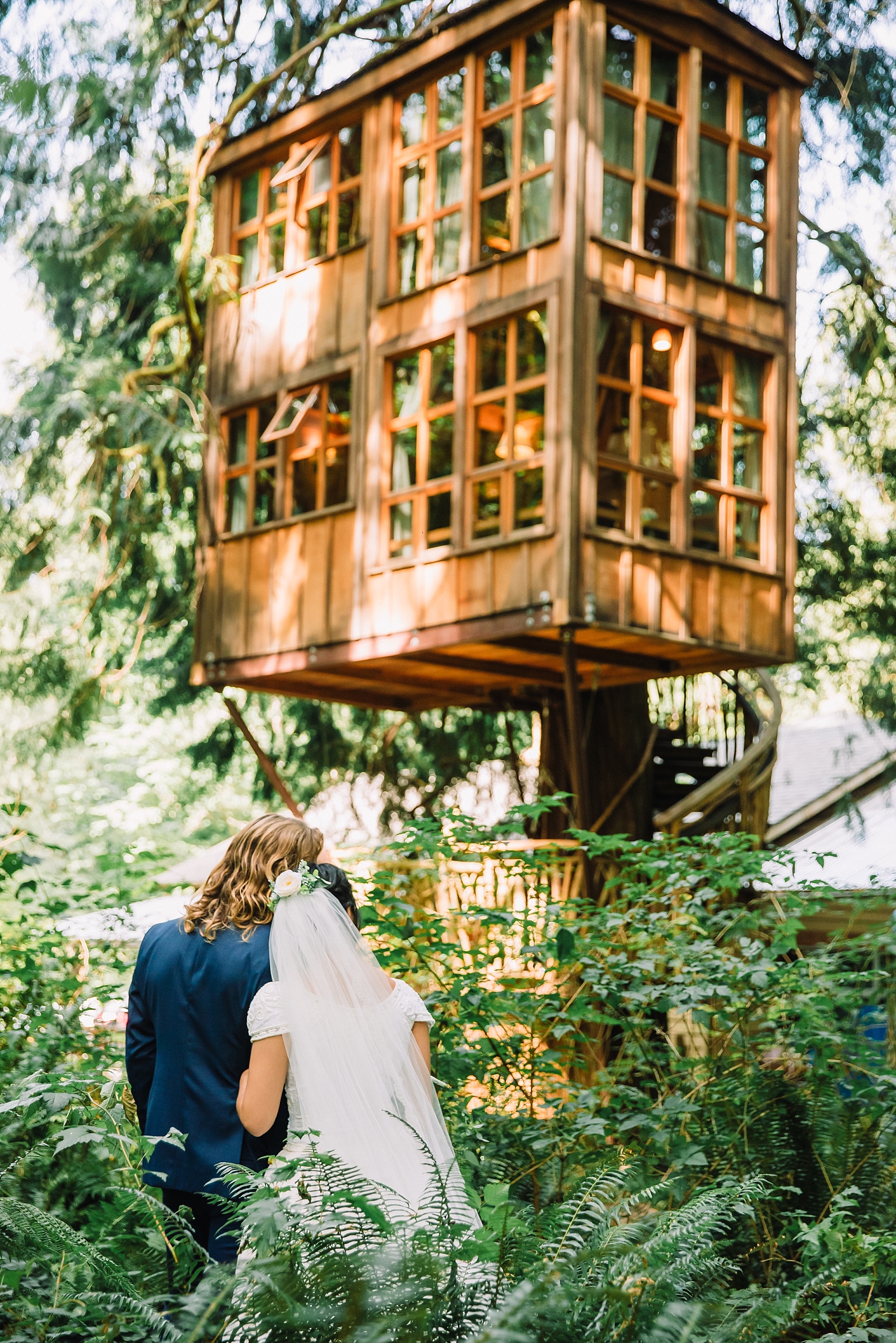 bride and groom at treehouse point wedding
