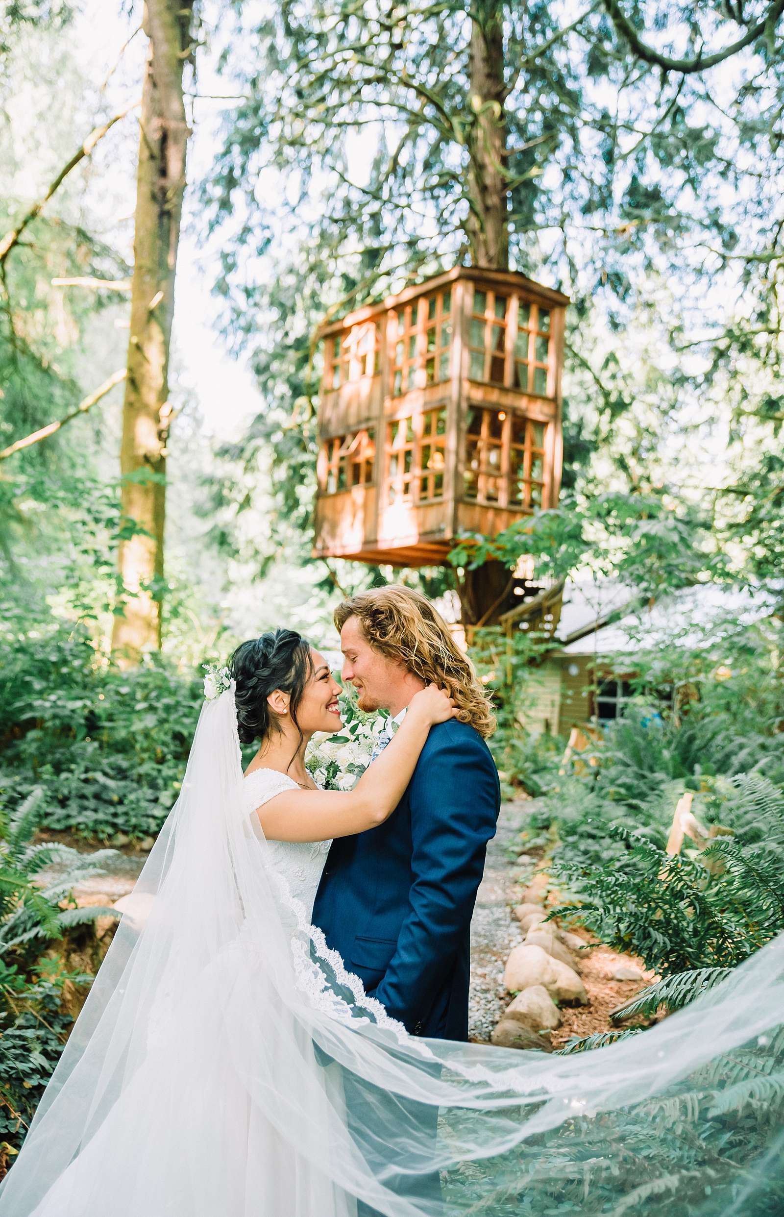 bride and groom at treehouse point wedding
