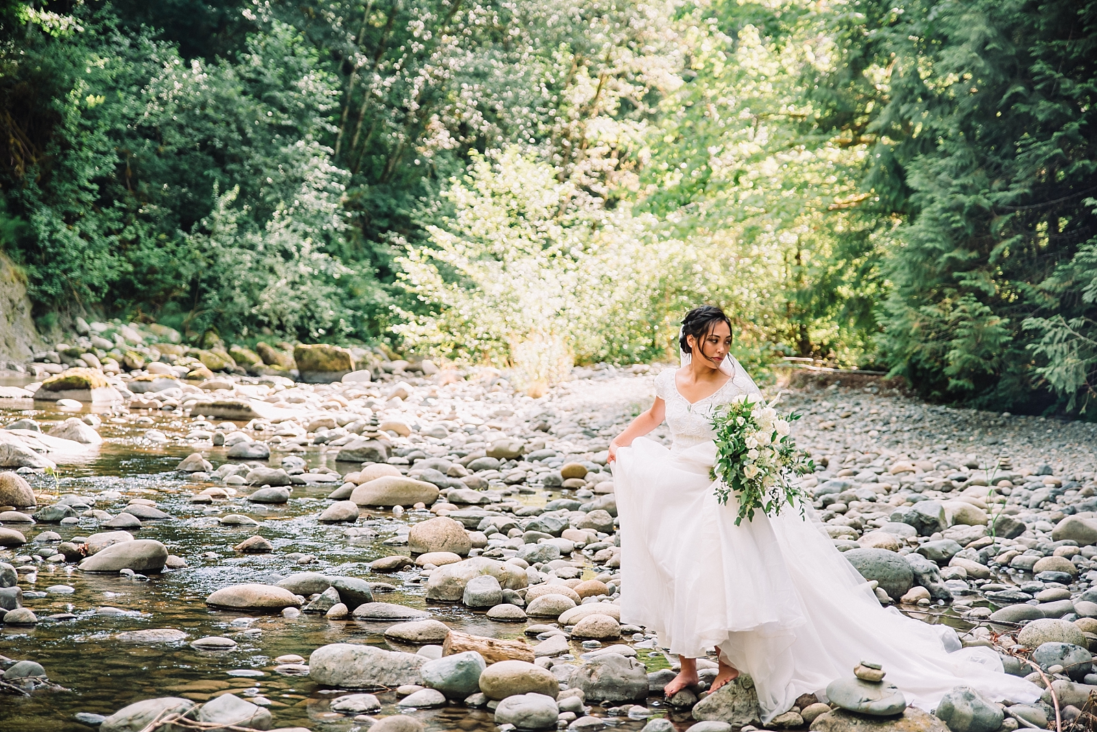 bride at treehouse point pnw river