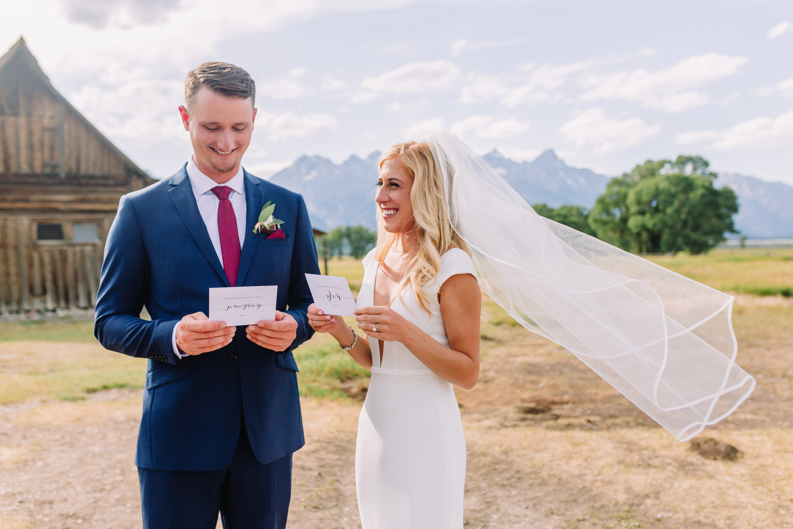 bride and groom at Mormon Row sharing their private vows to each other on their summer wedding day