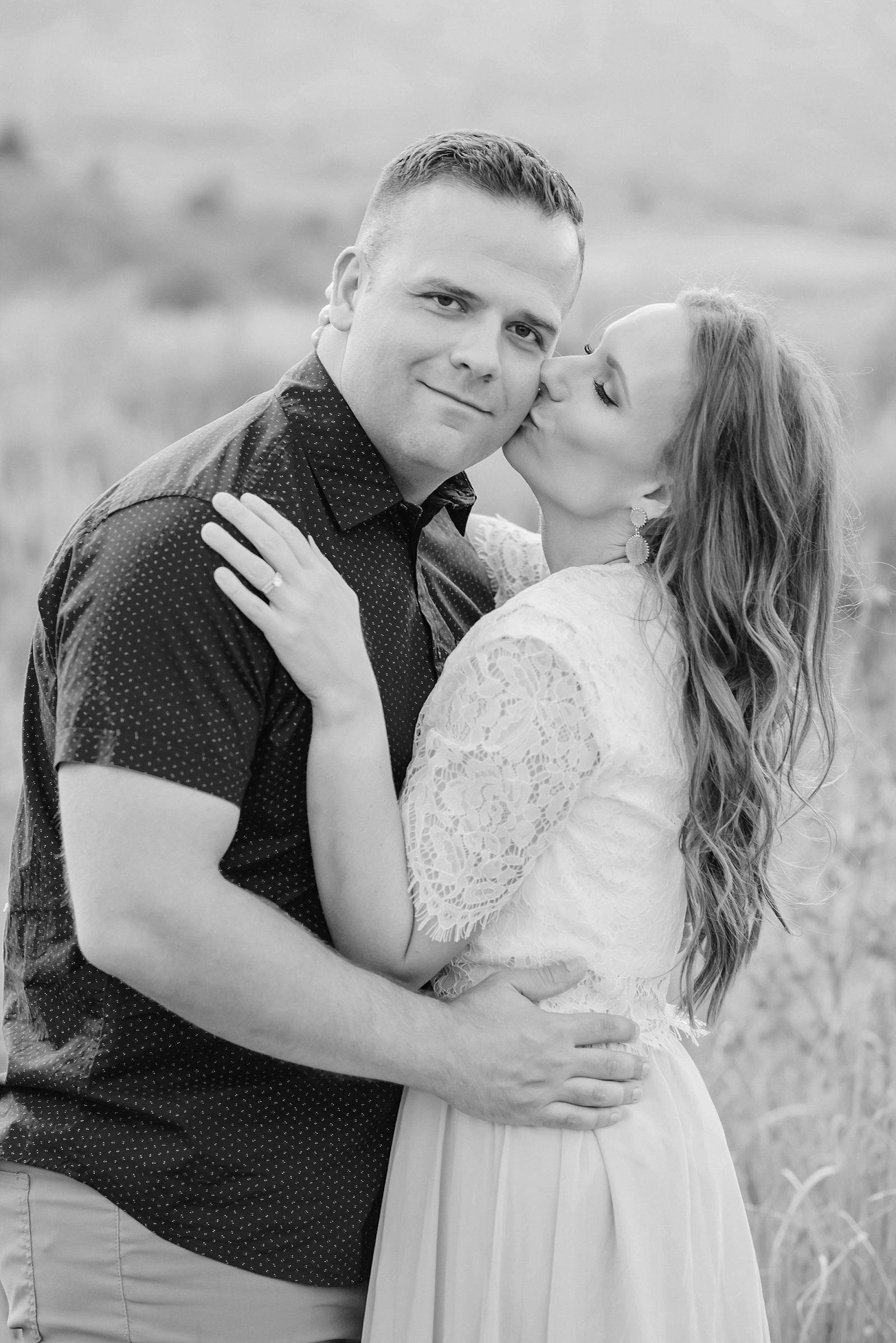 couple portraits in tall golden grass