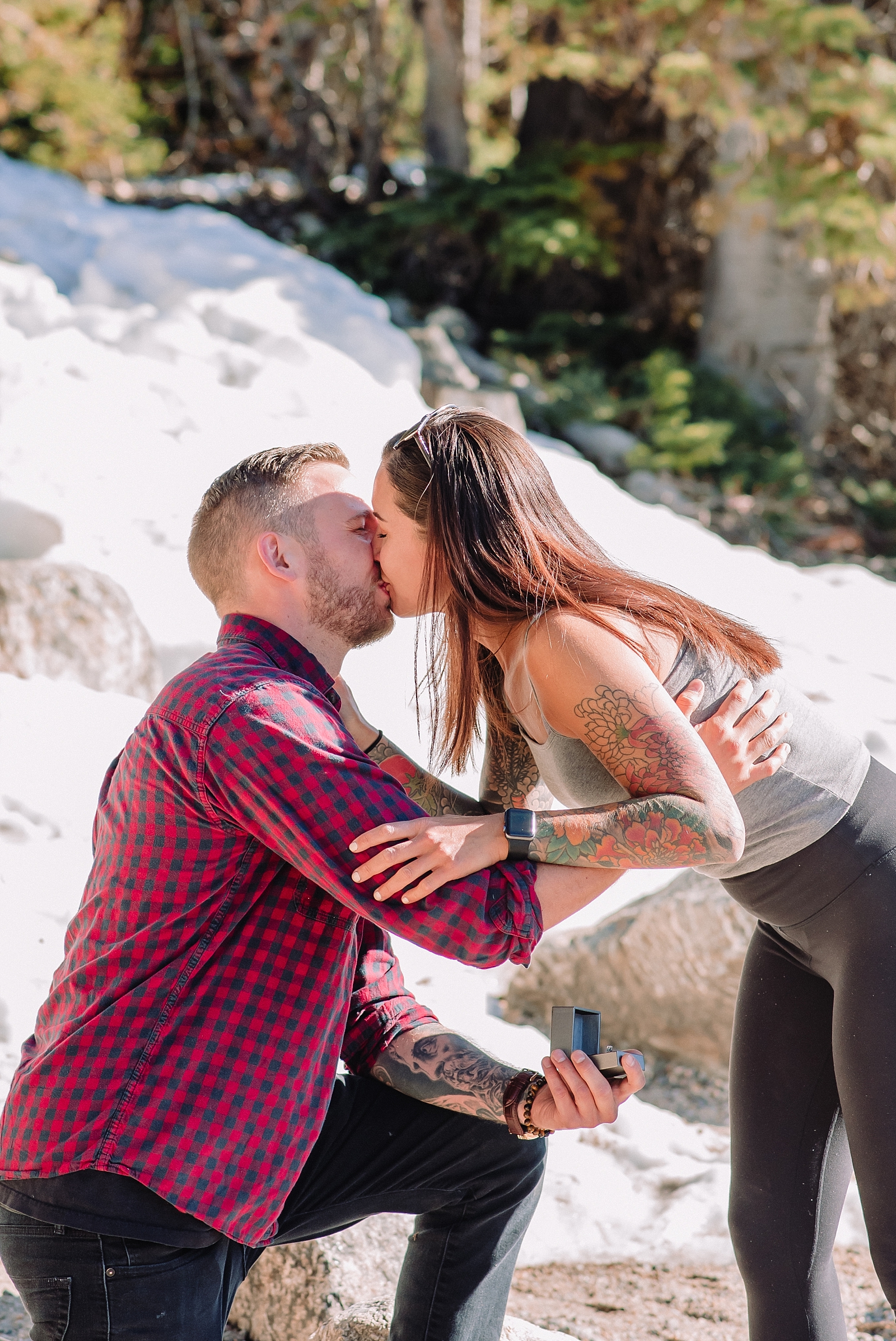 couple kisses after proposal