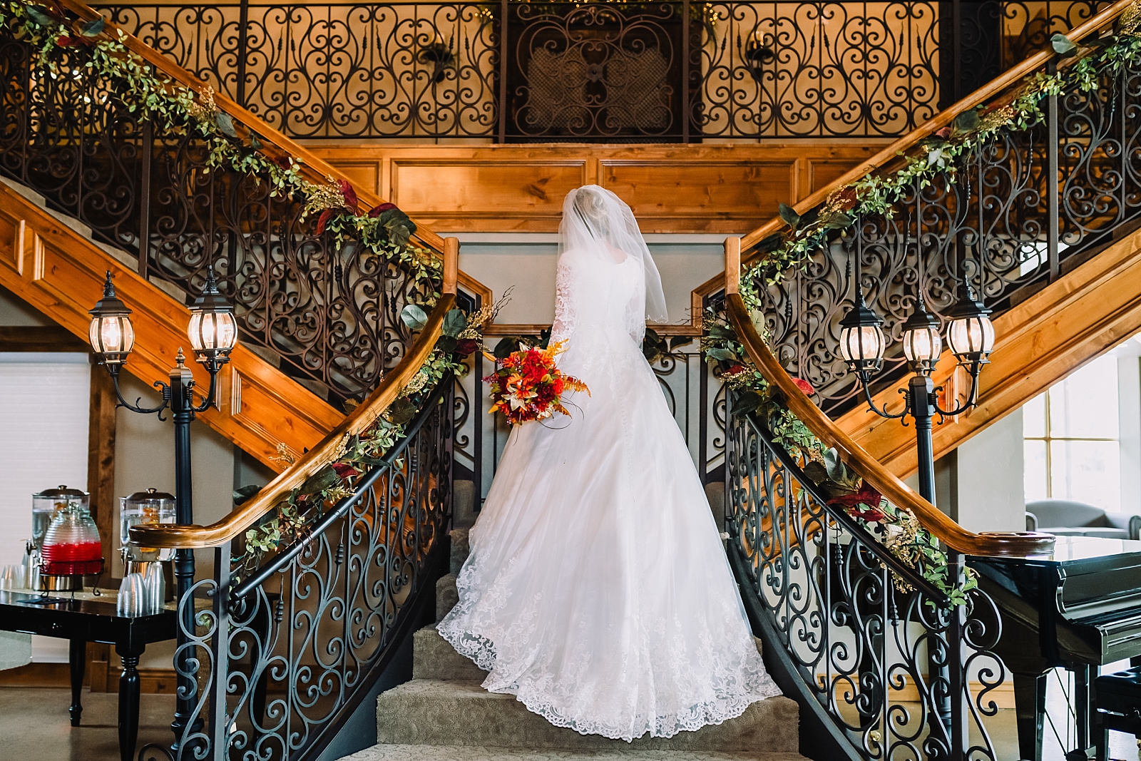bride walking up the stairs at the atrium 