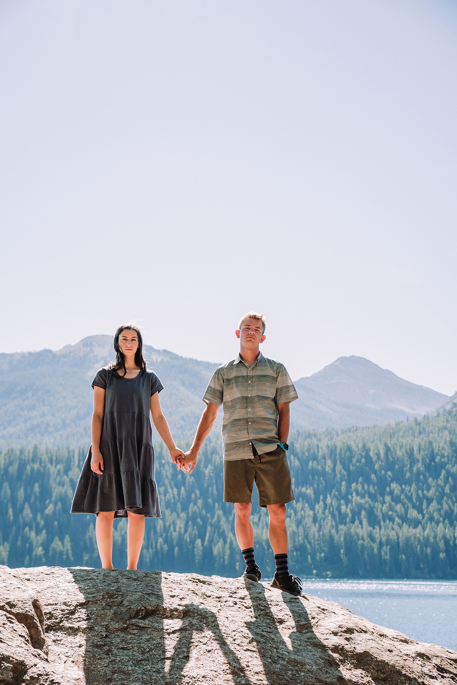 couple holding hands at grand tetons national park