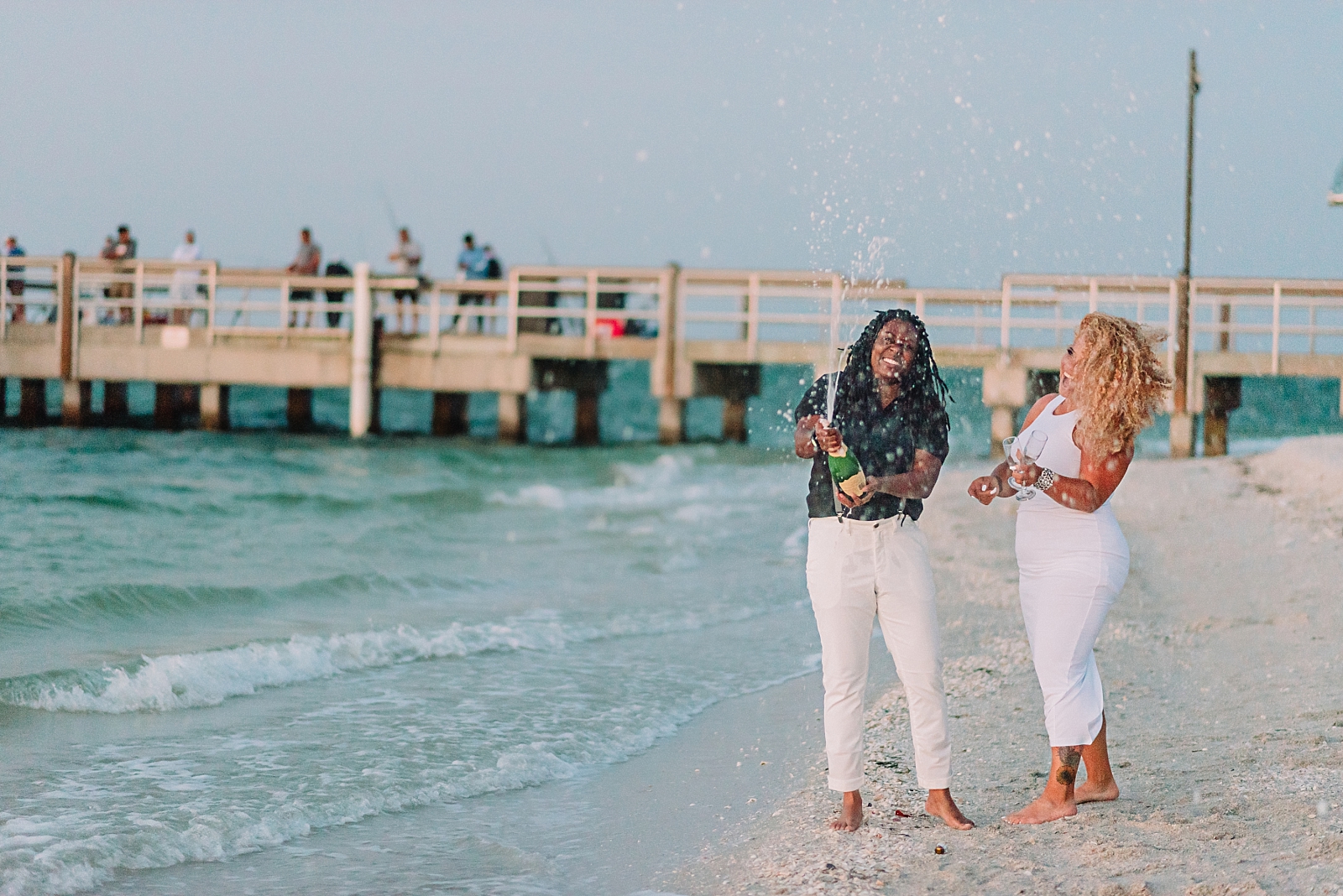 couple celebrating recent marriage in sanibel island bringing a photographer from home to capture their moments