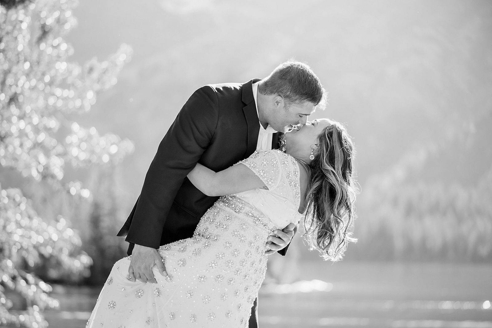 bride and groom kiss after wedding at jenny lake