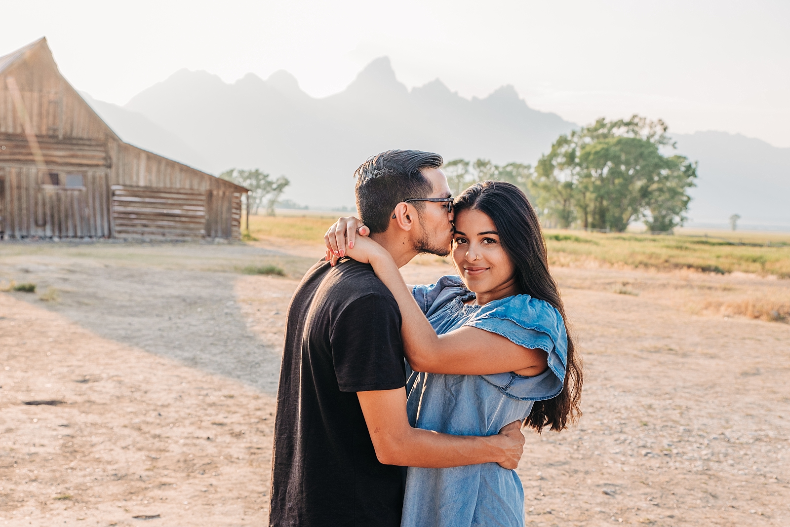 engaged couple mormon row barn