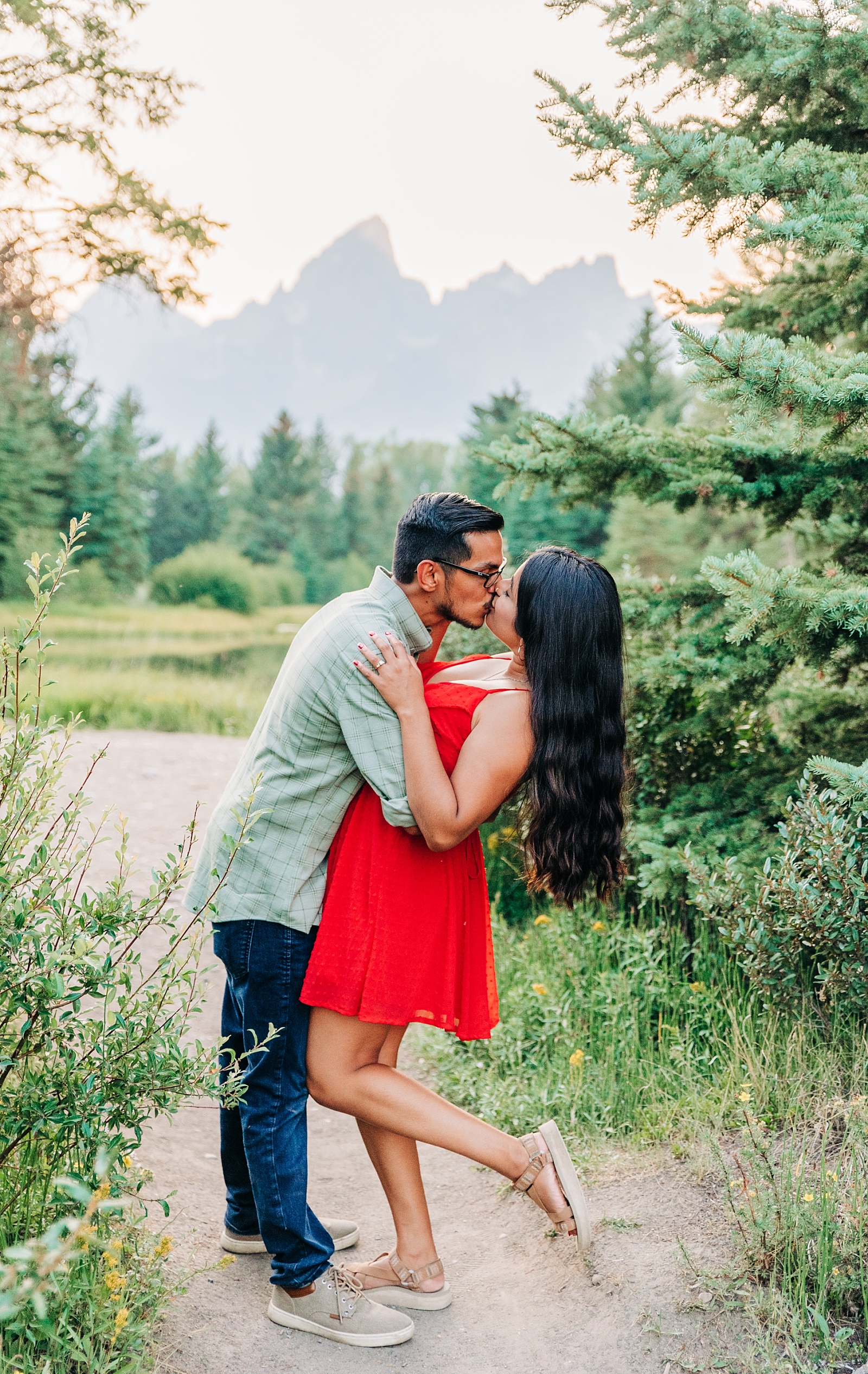 engaged couple at schwabacher's landing