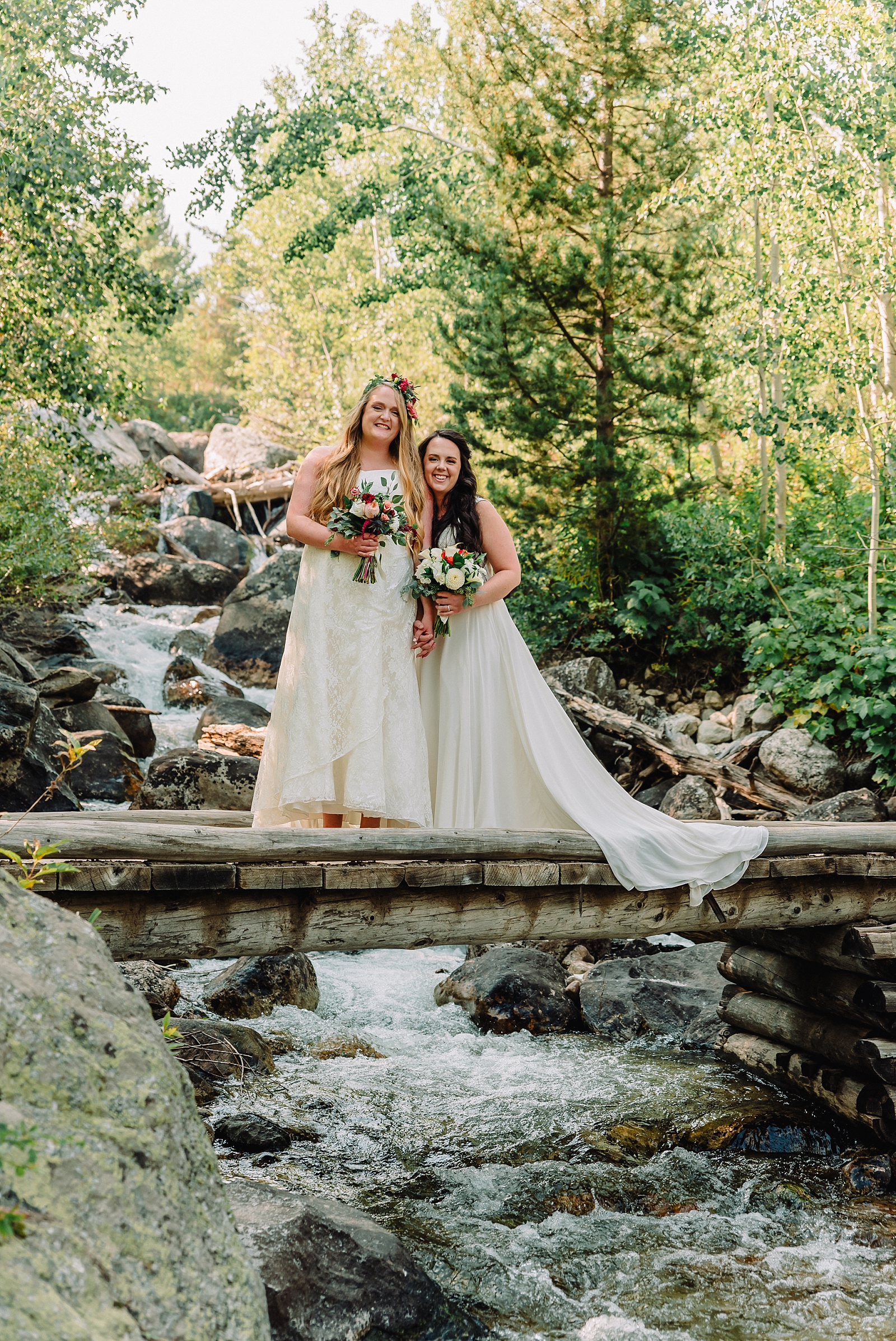two brides on bridge in grand teton national park
