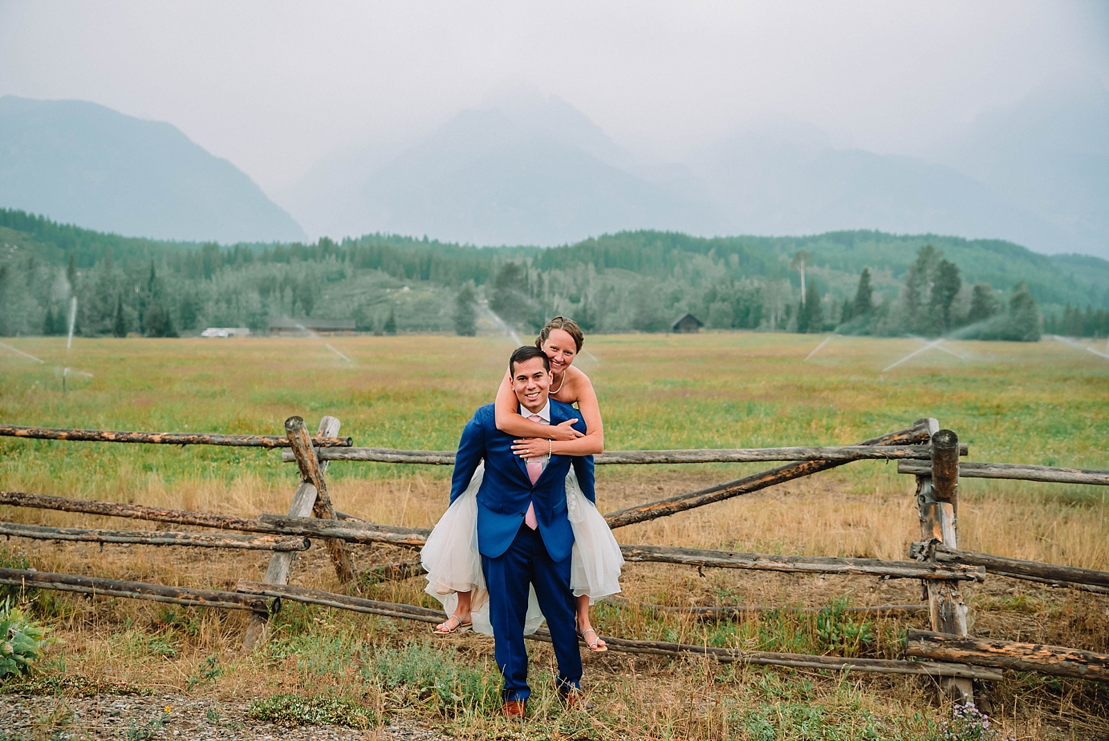 bride and groom at taggart lake trailhead