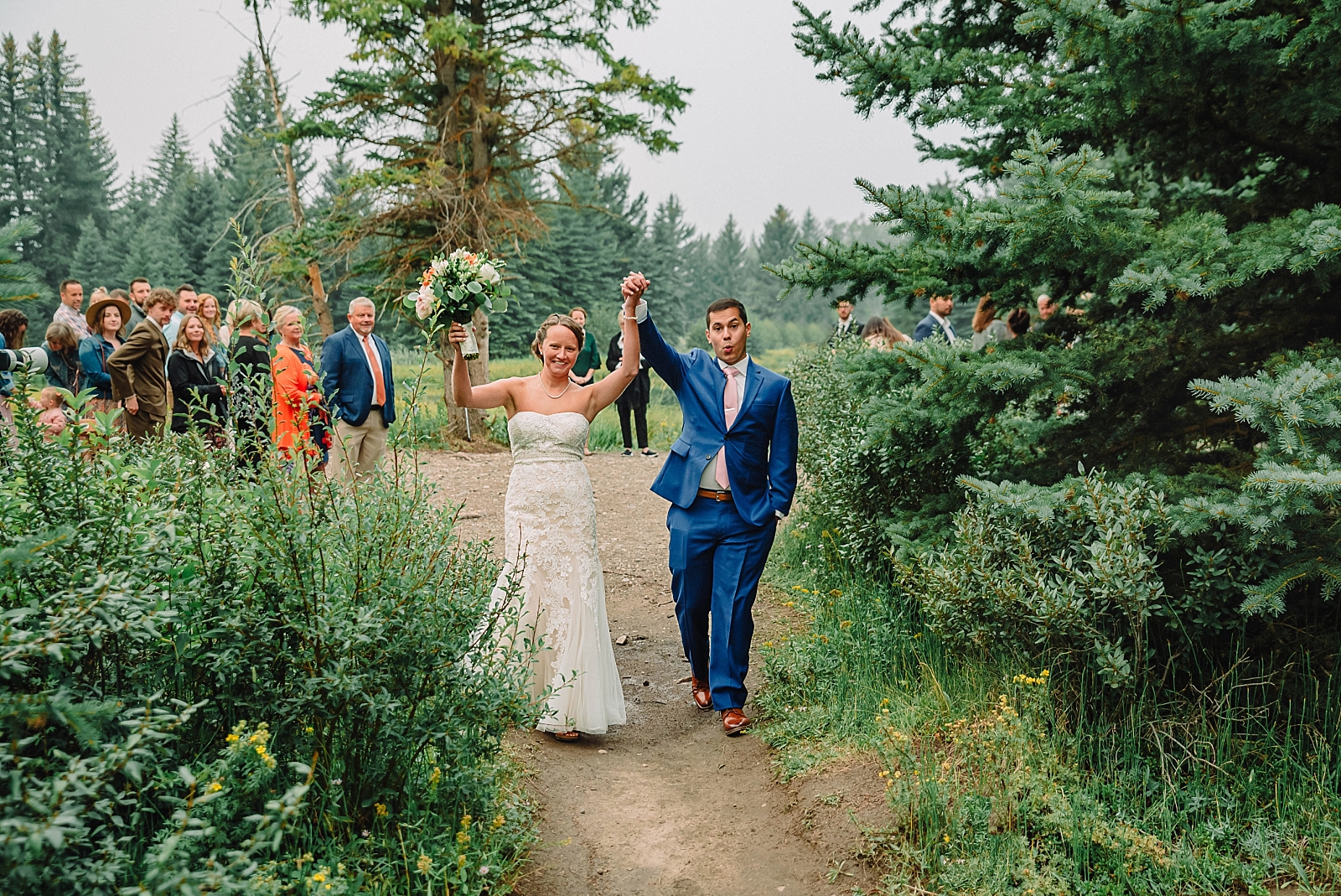 bride and groom exit outdoor wedding ceremony