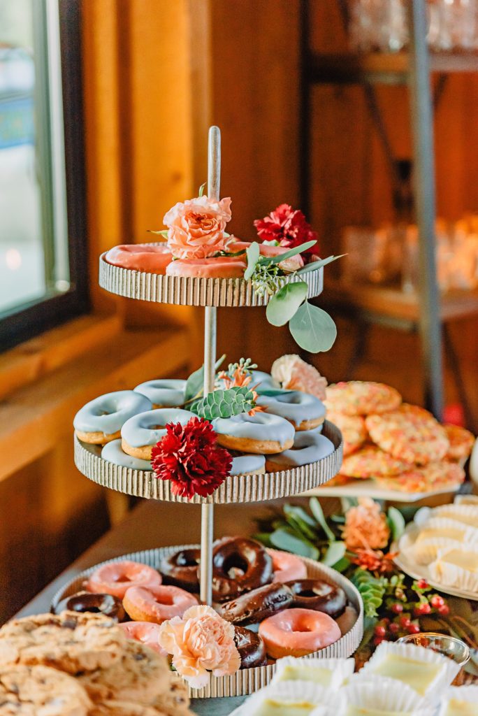 wedding donuts on a three tier tray for a dessert buffet