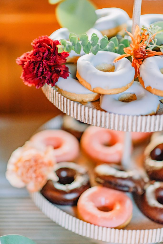 wedding donuts on a tray at a Jackson Hole wedding reception captured by Jackson Hole wedding photographer