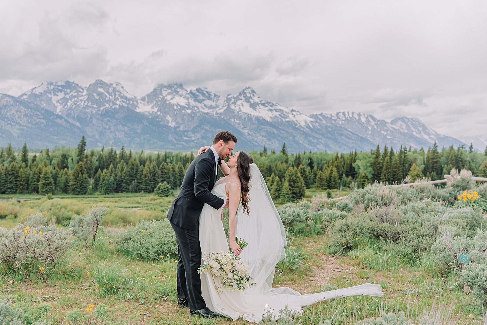 bride and groom in the tetons