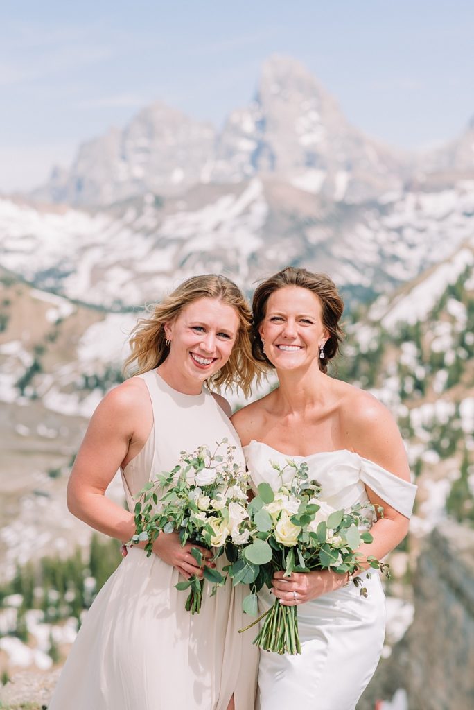 bride and bridesmaid in the tetons