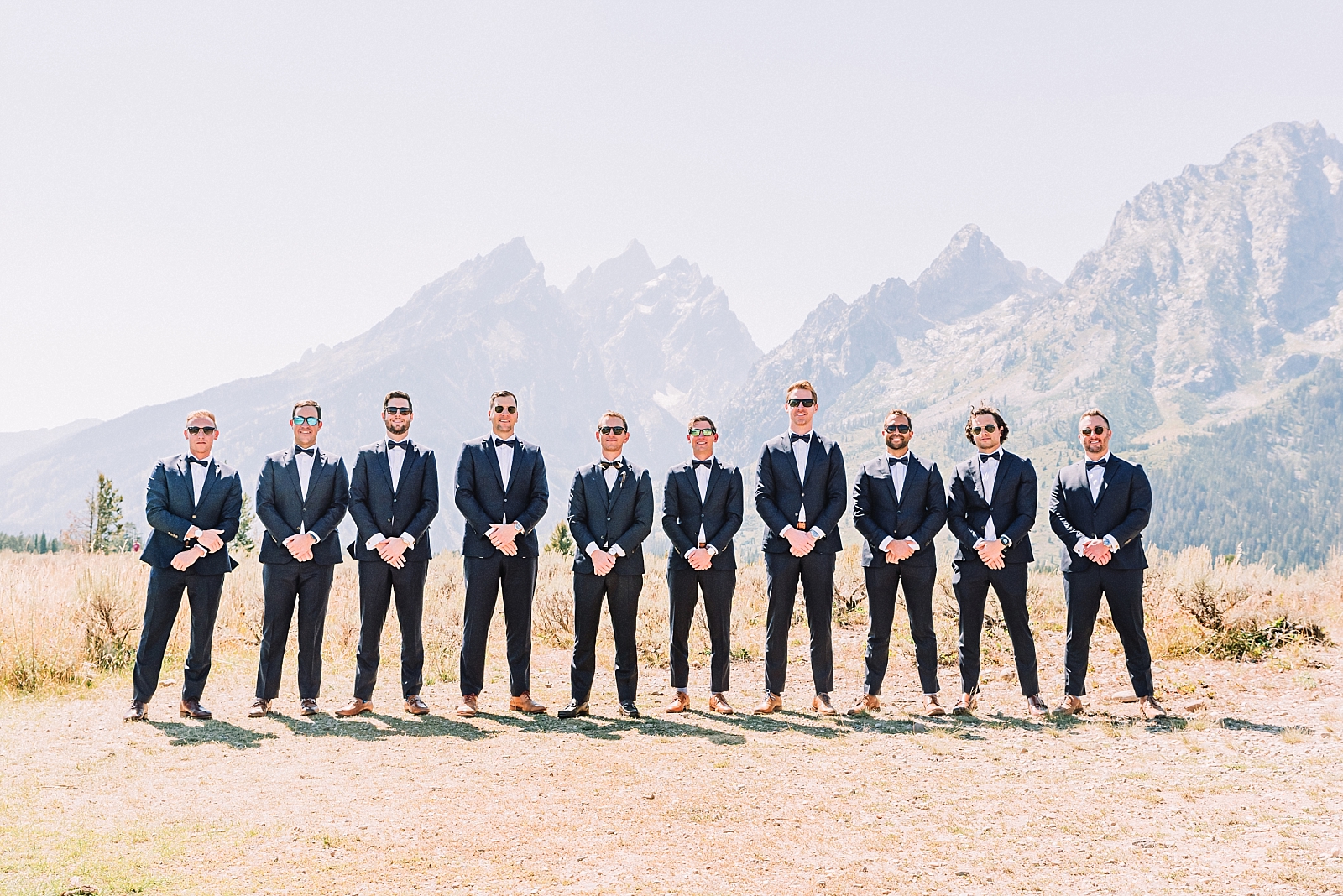 Groom and groomsman on wedding day in the tetons