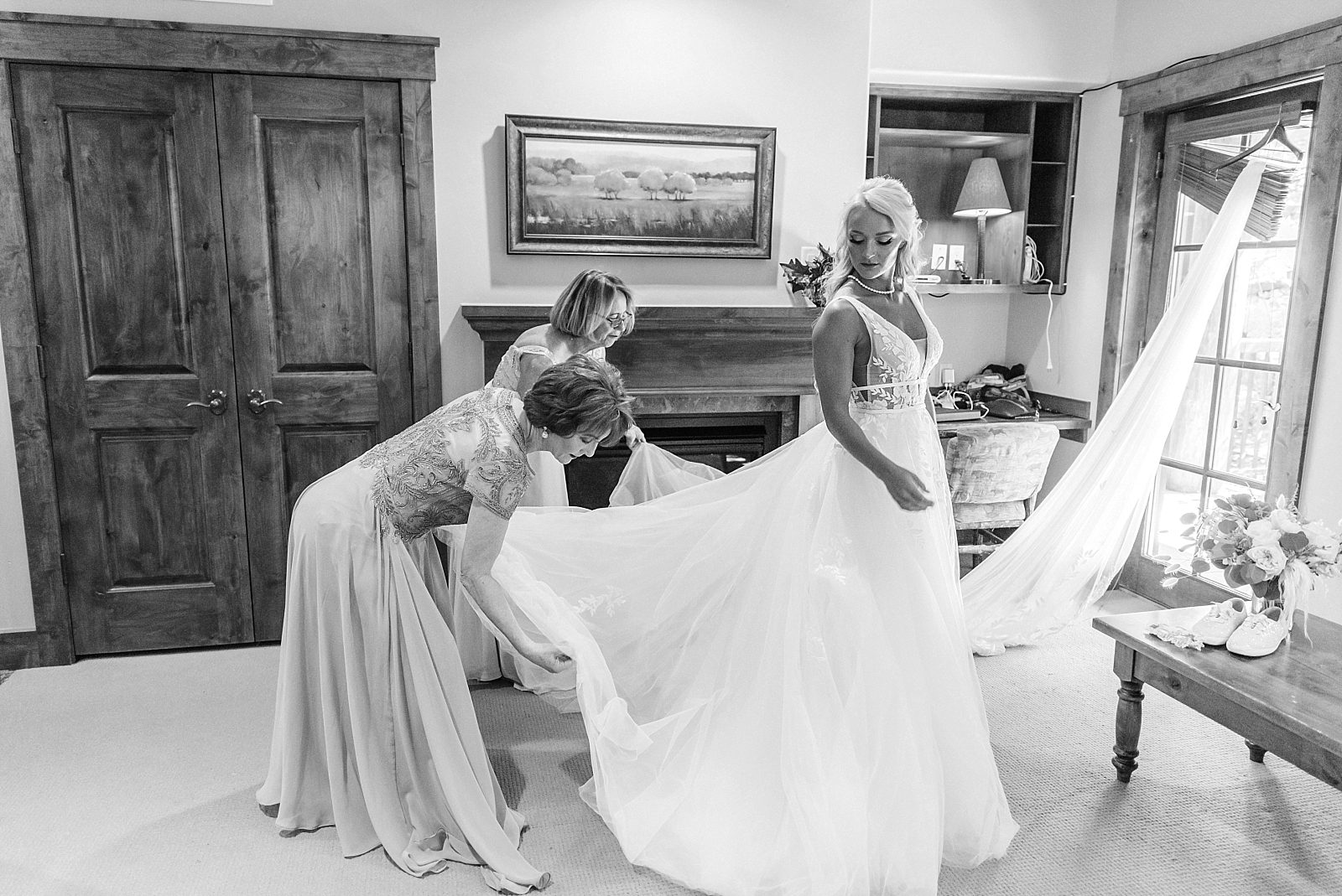 Bride gets ready with her mother and mother in law on wedding day, snow king resort wedding venue