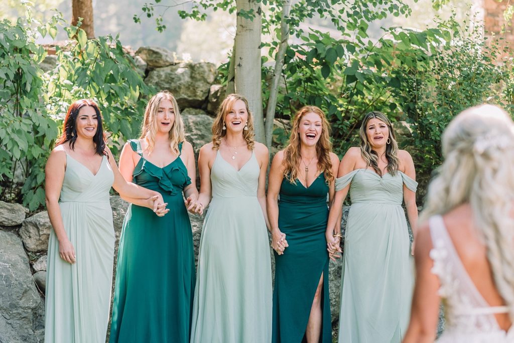 Bride has first look with bridesmaids