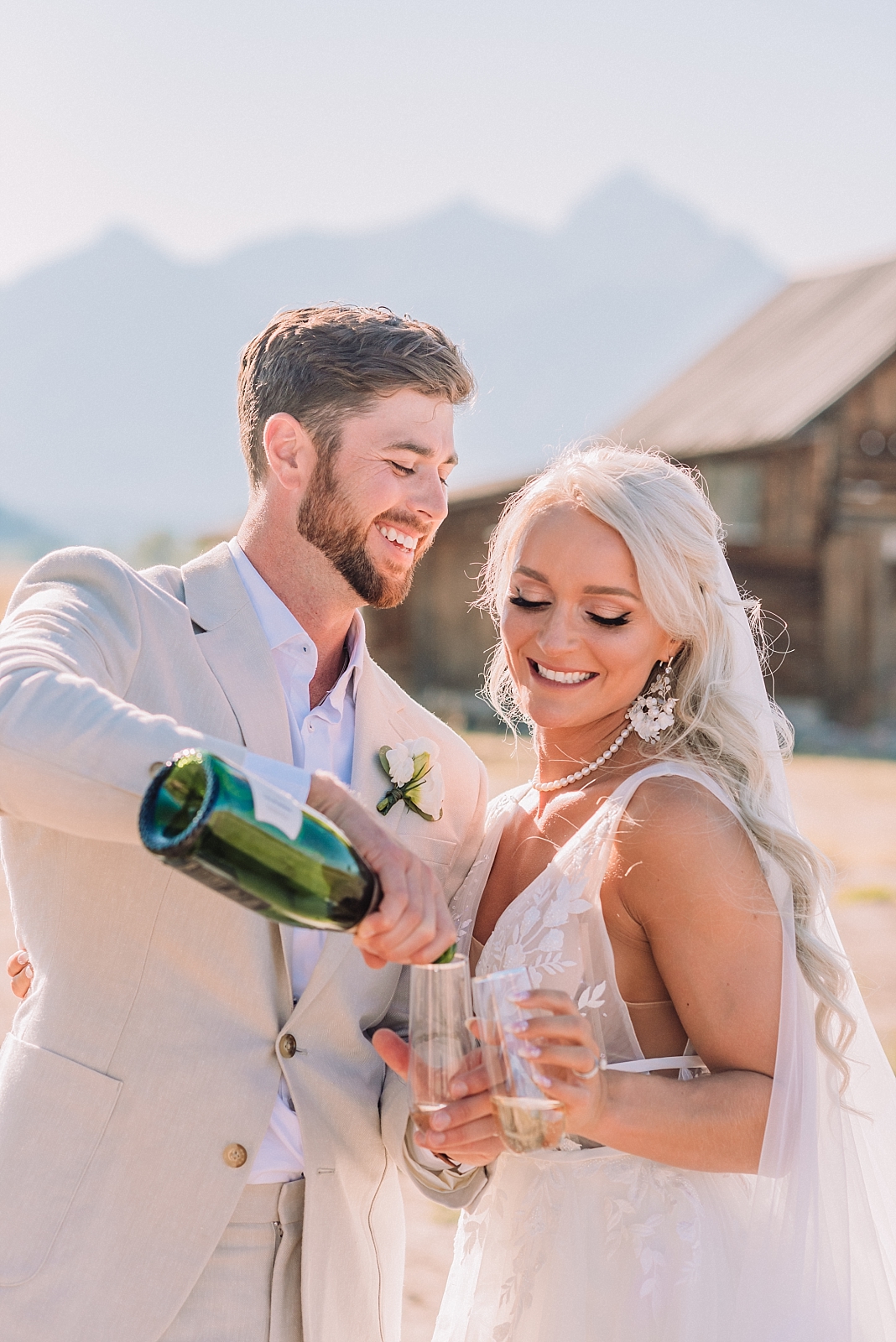 Bride and groom share champagne