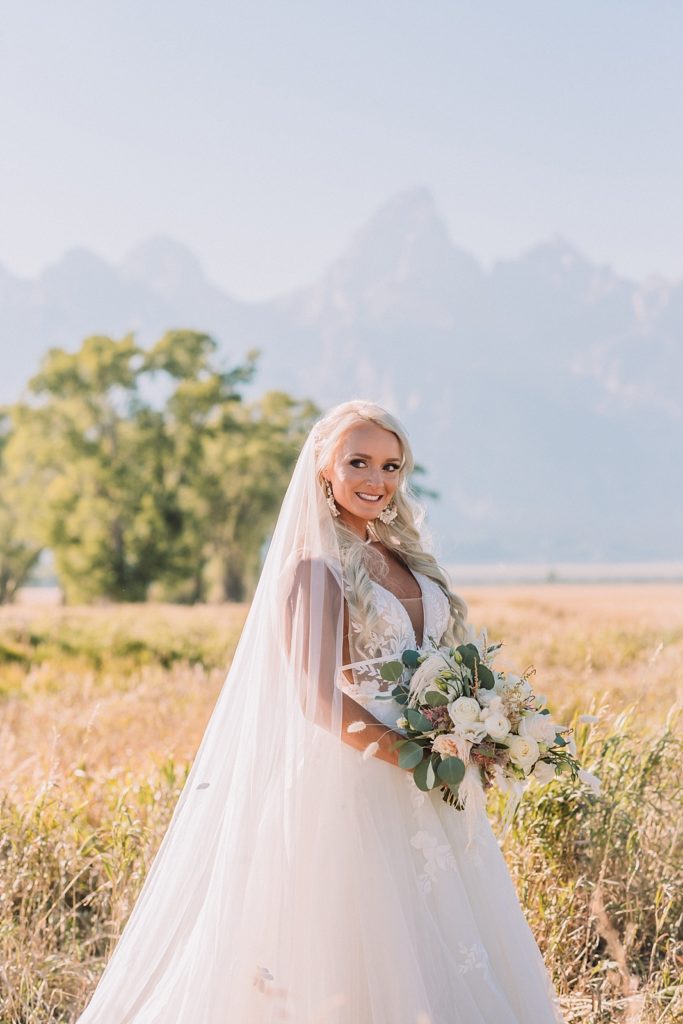 bride and flowers at Mormon Row