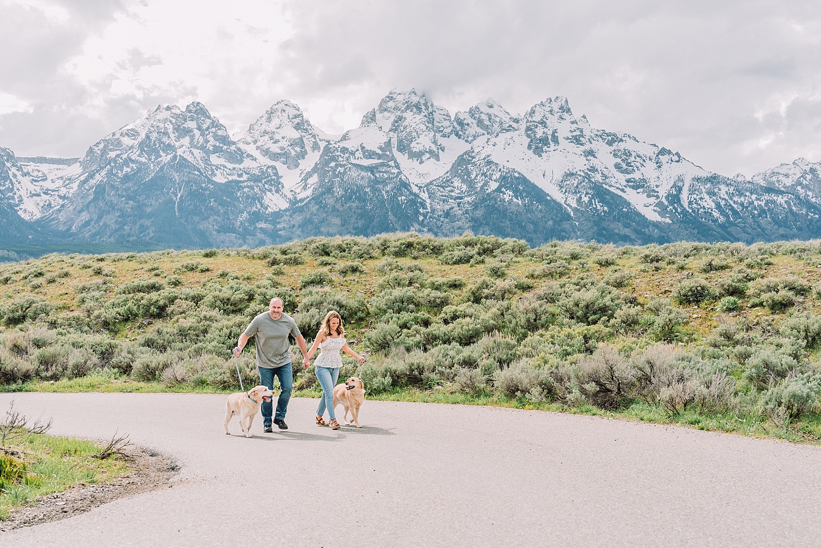 couple with dogs celebrates their Jackson Hole anniversary portraits
