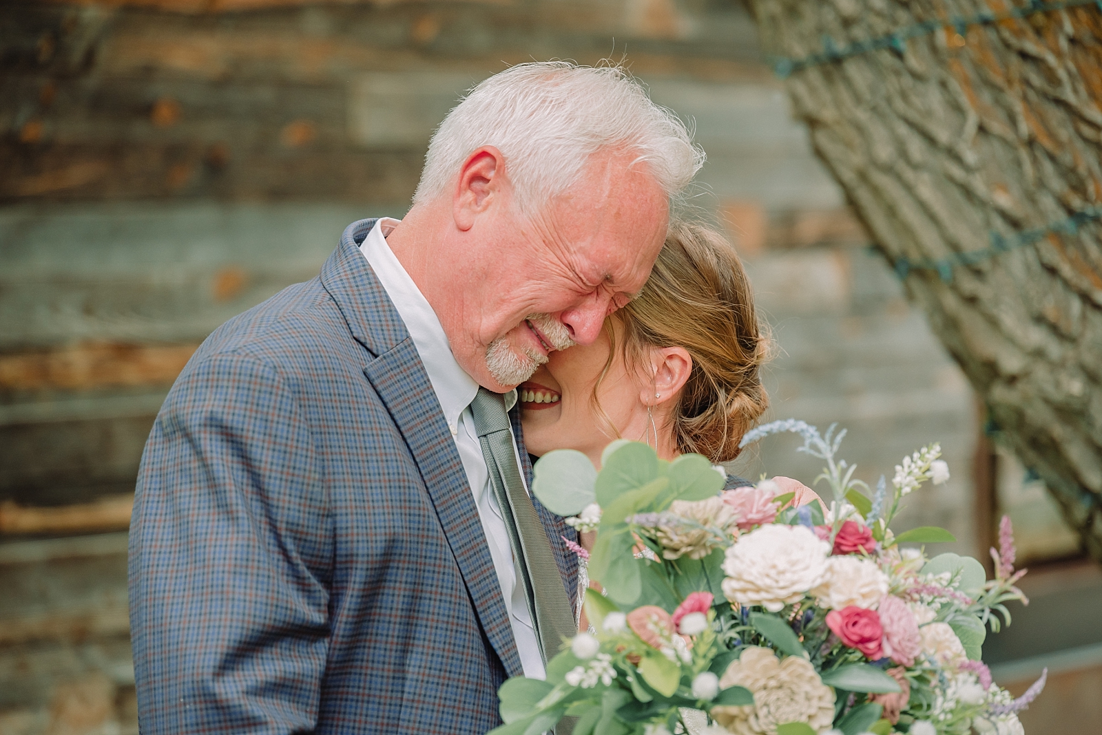 bride and her dad share first look on wedding day