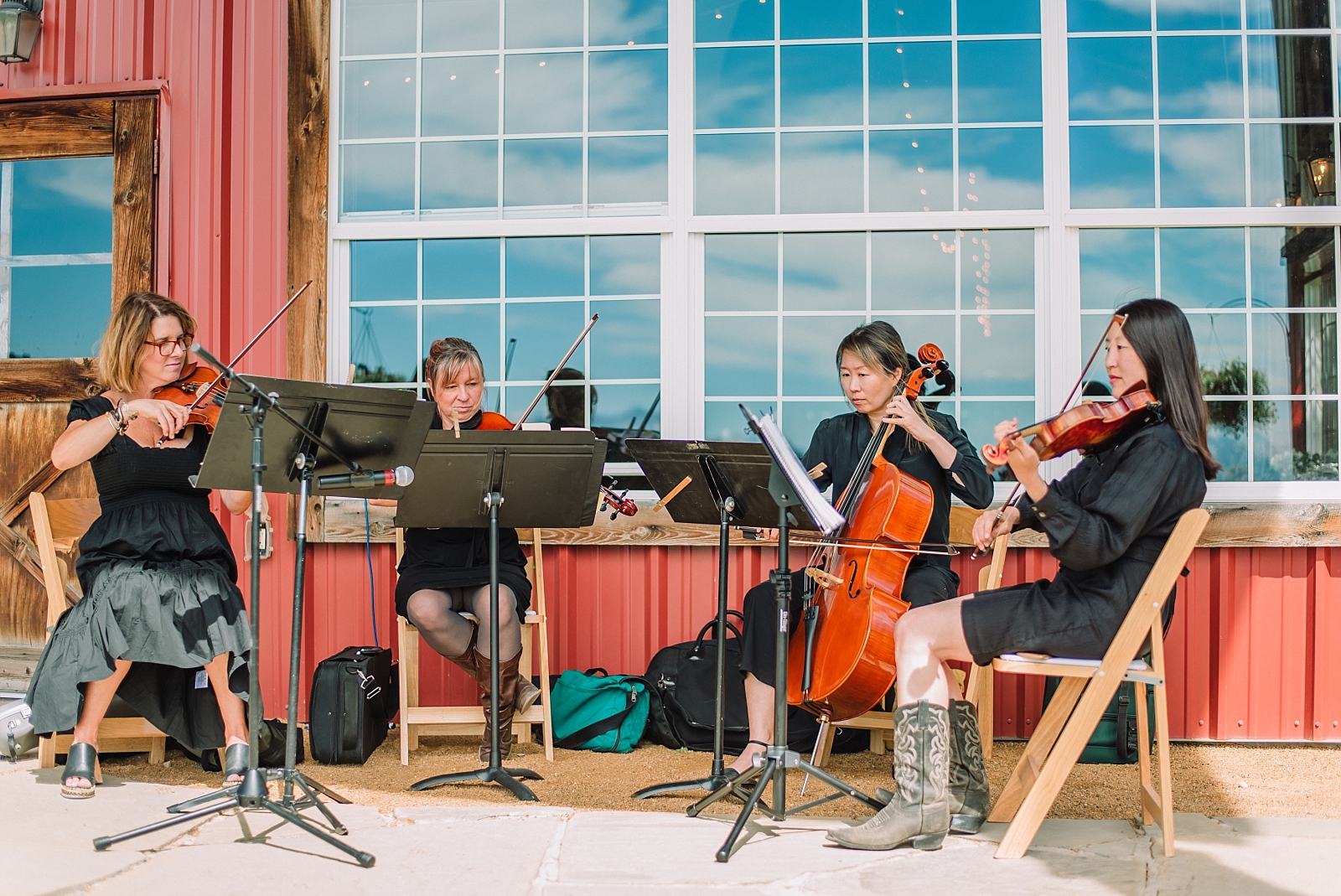 snake river strings performs during diamond cross ranch wedding ceremony