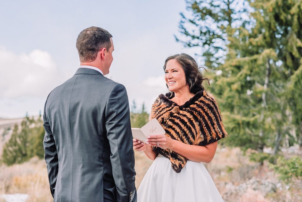 bride reads vows to groom in jackson hole wedding ceremony
