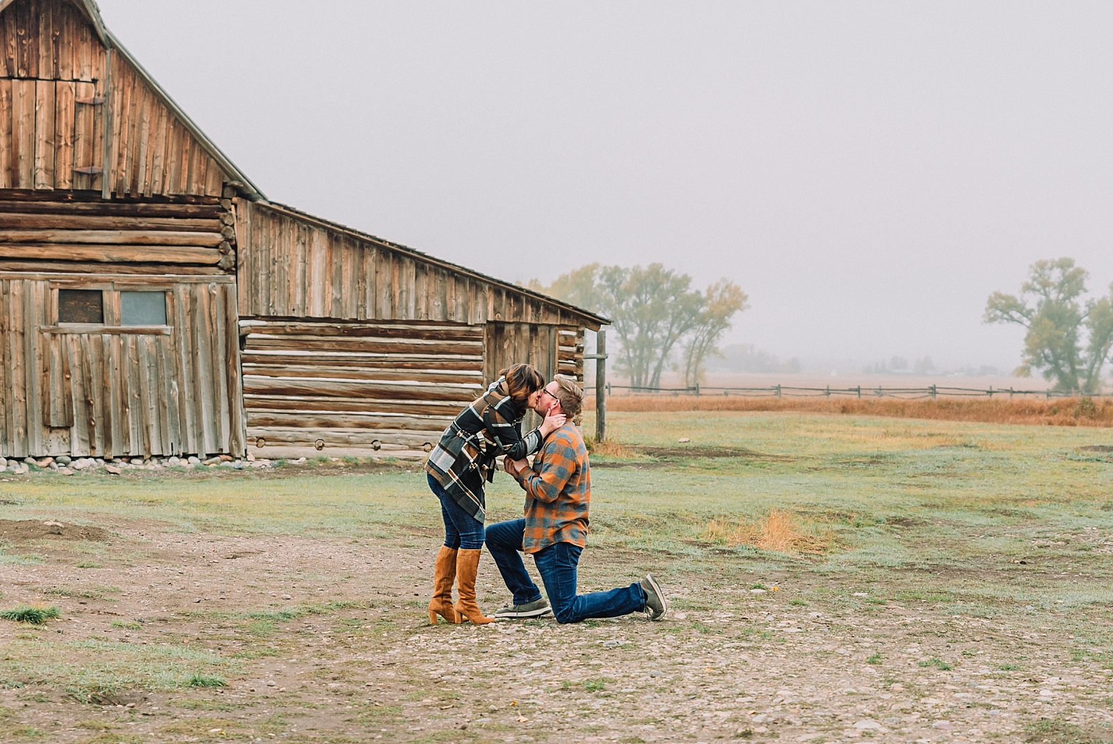 boyfriend proposes to girlfriend in Foggy Mormon Row Proposal