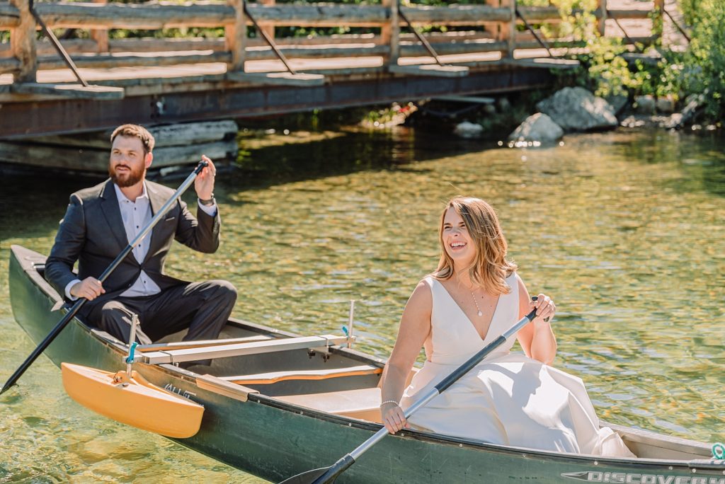 bride and groom on jenny lake in a canoe, unique wedding day ideas, alternative wedding day activities