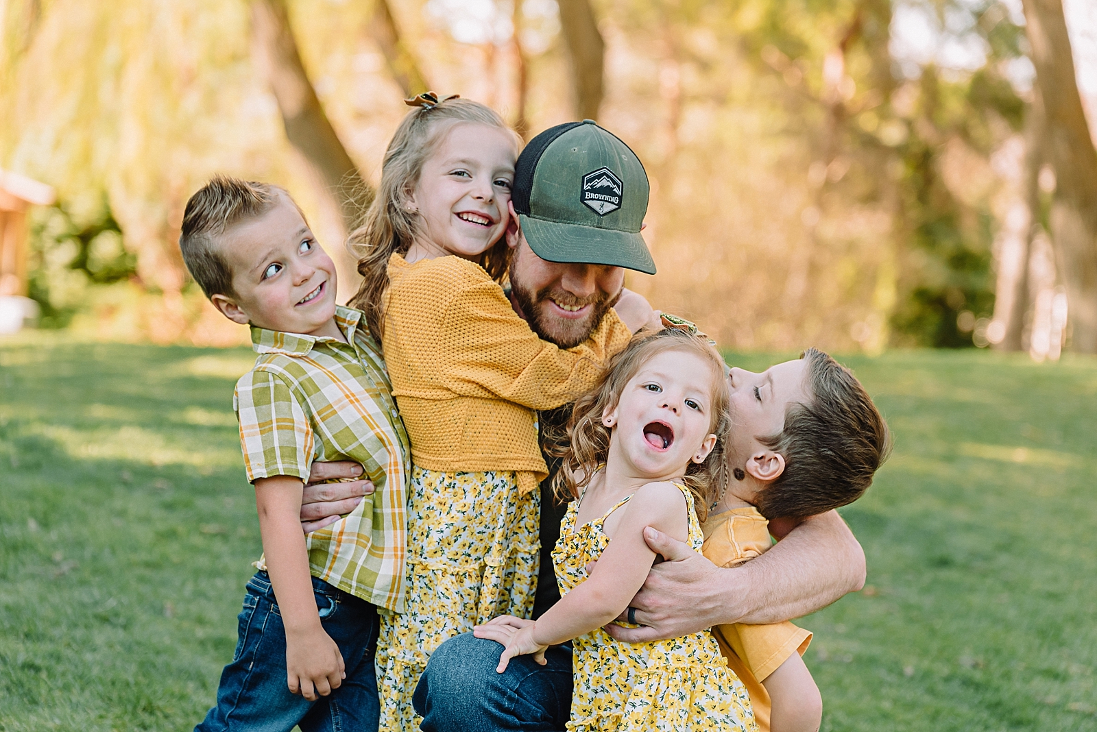 father and children in family photos