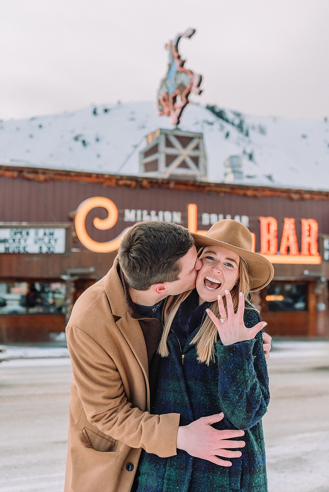 Jackson Hole Engagement Photography in front of the Million Dollar Cowboy Bar