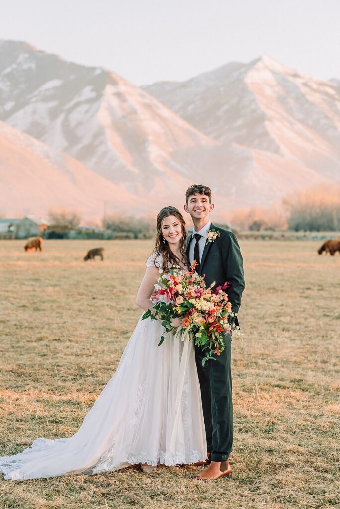 Utah Wedding Photography, Bride and Groom couple portraits at River Bridge Event Center, Field and mountain wedding portraits