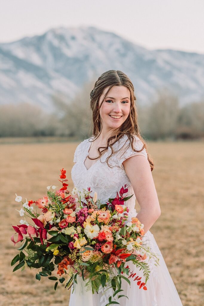 Utah Wedding Photography, Bride and Groom couple portraits at River Bridge Event Center, Field and mountain wedding portraits
