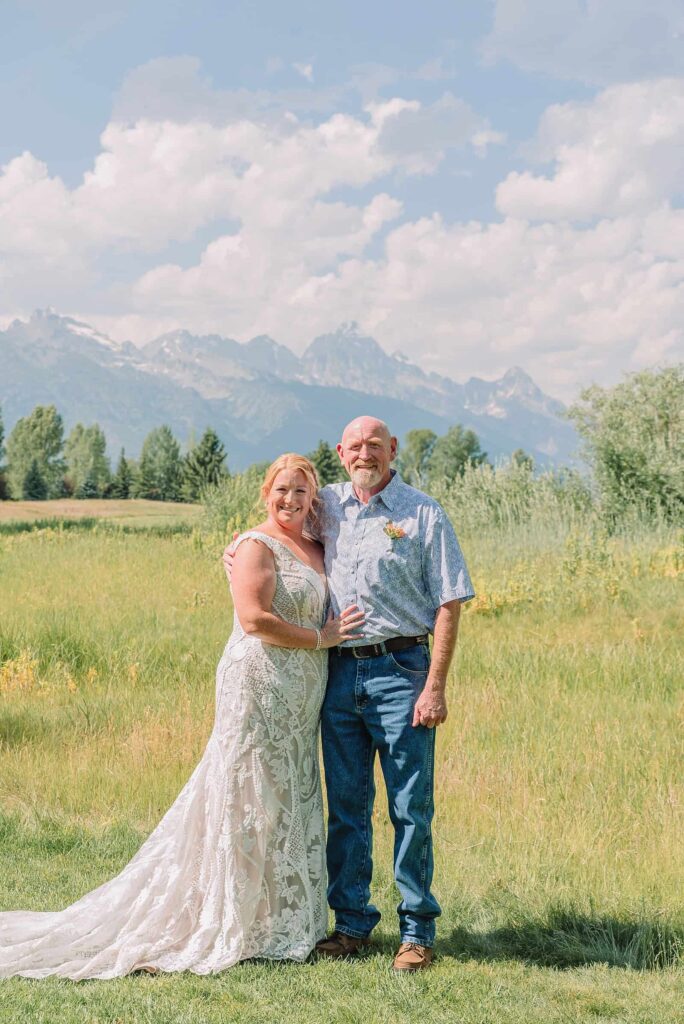 first look with bride and her dad on wedding day in the mountains