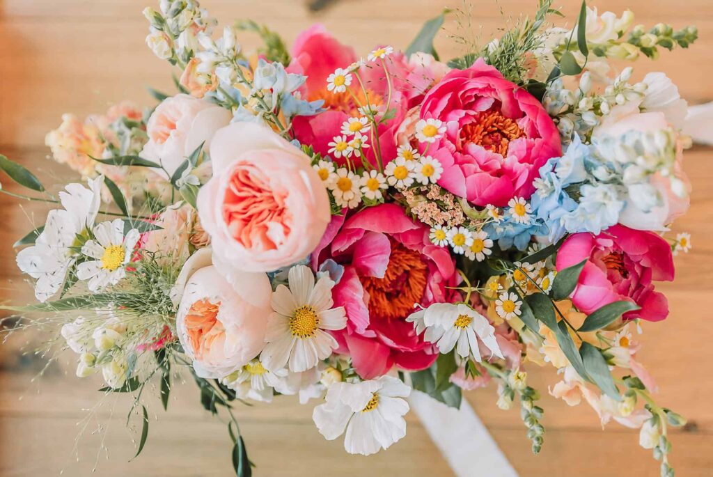 colorful bridal bouquet with peonies by Eden Flower Farm in Idaho