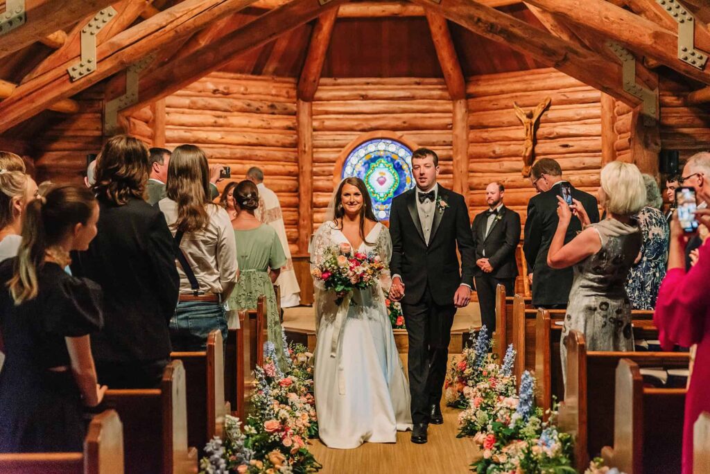 indoor wedding ceremony, chapel of the sacred heart catholic wedding, wedding photographer in jackson hole