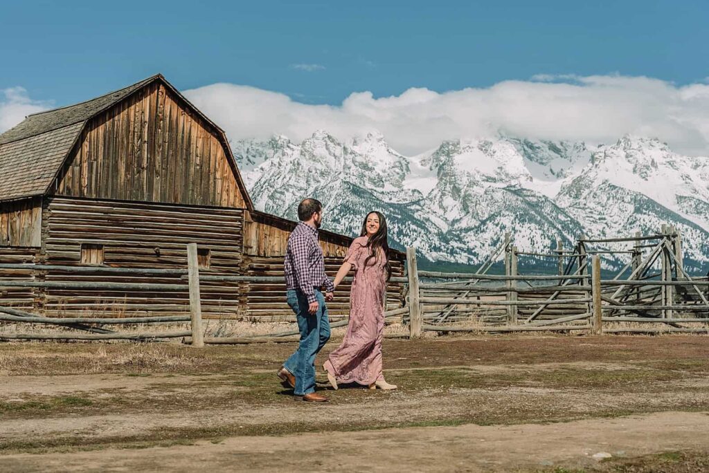 spring engagements in the snow, jackson hole engagement photographer, jackson hole photographer, photography in grand teton national park, wyoming photographer, destination photographer, spring outfit ideas