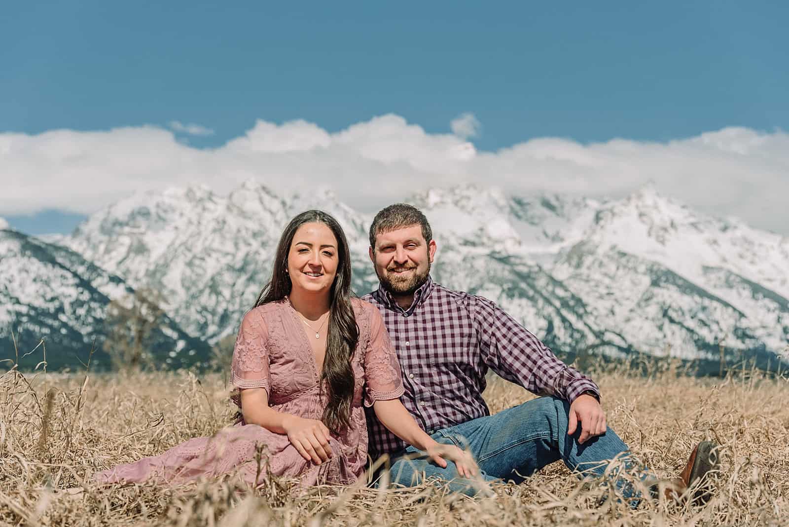 spring engagements in the snow, jackson hole engagement photographer, jackson hole photographer, photography in grand teton national park, wyoming photographer, destination photographer, spring outfit ideas