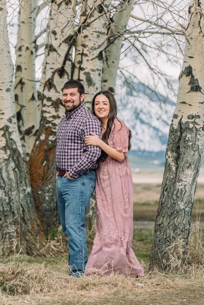 spring engagements in the snow, jackson hole engagement photographer, jackson hole photographer, photography in grand teton national park, wyoming photographer, destination photographer, spring outfit ideas