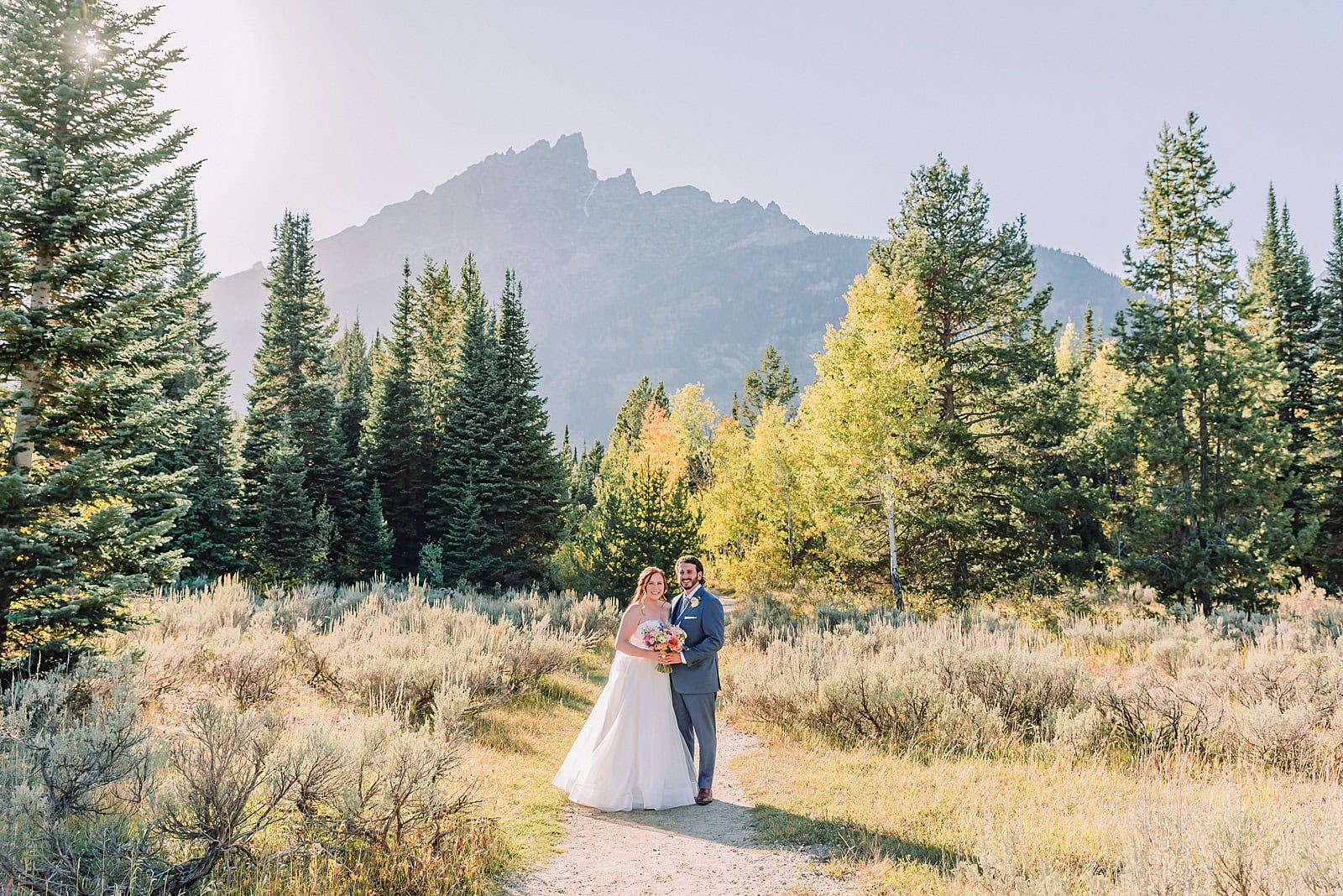 Grand Teton Elopement Photographer Mountain Elopement Photographer Adventure Elopement Photographer Grand Teton Grand Teton Destination Wedding Photographer Wyoming Elopement Photographer Outdoor Elopement Photographer Wyoming mountain wedding nature wedding timeless wedding classy wedding jenny lake wedding portraits romantic wedding dresses