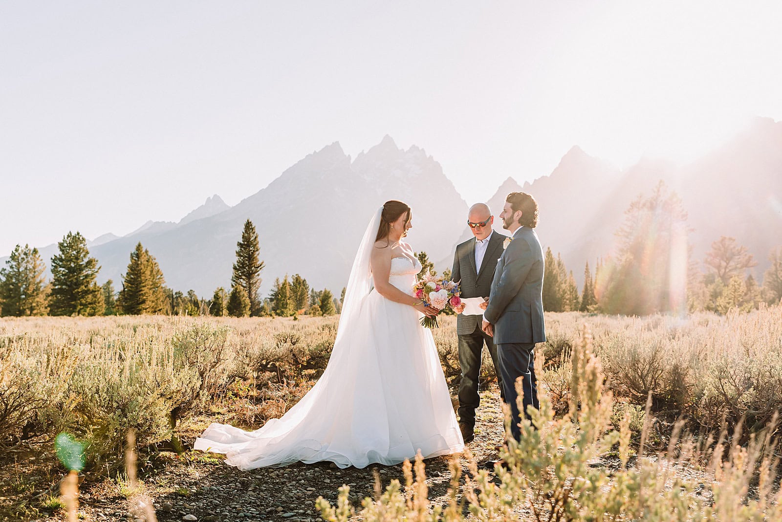 Grand Teton Elopement Photographer Mountain Elopement Photographer Adventure Elopement Photographer Grand Teton Grand Teton Destination Wedding Photographer Wyoming Elopement Photographer Outdoor Elopement Photographer Wyoming mountain wedding nature wedding timeless wedding classy wedding jenny lake wedding portraits romantic wedding dresses