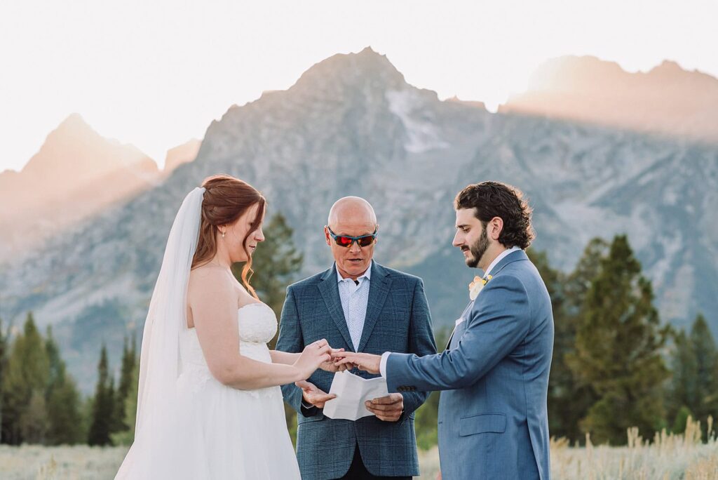 Grand Teton Elopement Photographer romantic wedding dresses outdoor wedding small intimate wedding ideas mountain wedding nature wedding timeless wedding classy wedding elopement elopement photography destination wedding Jackson Hole Wedding Photographer mountain view turnout wedding