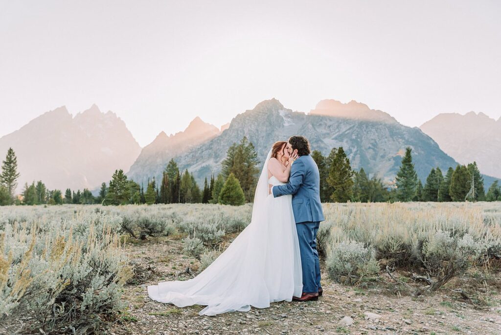 Grand Teton Elopement Photographer romantic wedding dresses outdoor wedding small intimate wedding ideas mountain wedding nature wedding timeless wedding classy wedding elopement elopement photography destination wedding Jackson Hole Wedding Photographer mountain view turnout wedding