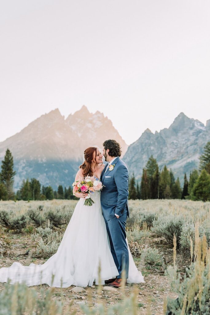 Grand Teton Elopement Photographer romantic wedding dresses outdoor wedding small intimate wedding ideas mountain wedding nature wedding timeless wedding classy wedding elopement elopement photography destination wedding Jackson Hole Wedding Photographer mountain view turnout wedding